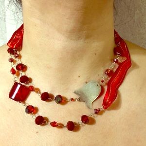 Red necklace made of silver